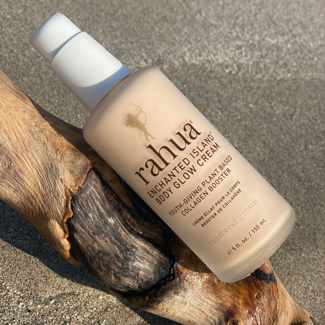 Enchanted Island Body Cream product on the beach