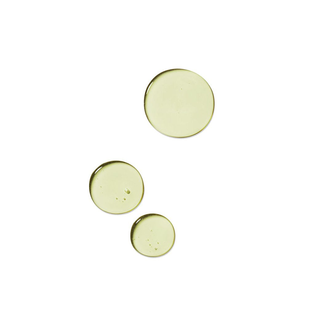 three dots of thin greenish gel liquid rahua voluminous shampoo on a white background to show texture|variant:16-oz